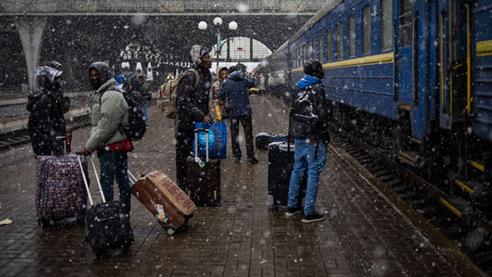 Nigeria students in Ukraine wait at the platform in Lviv railway station. 