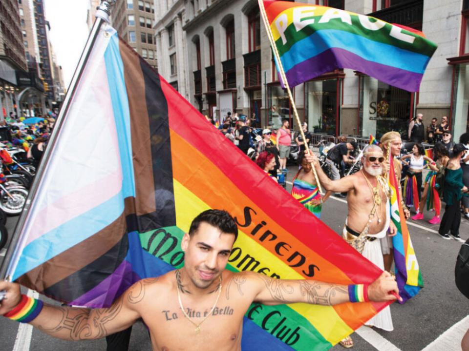 Revelers wait for the start of the NYC Pride March Sunday in New York. (AP Photo)