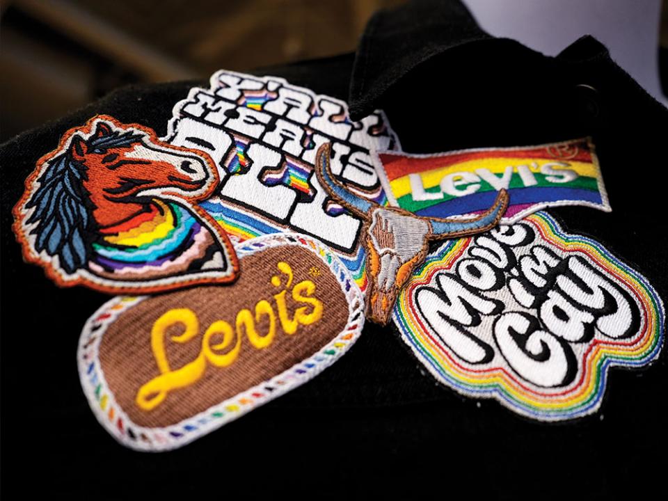 A jacket with patches from Levi's Pride collection is displayed at a Levi's Store in downtown Chicago, Monday, June 10, 2024. Many big retailers, including Levi's, Target, Old Navy and Urban Outfitters, have put out Pride collections for years. AP Photo by Nam Y. Huh.