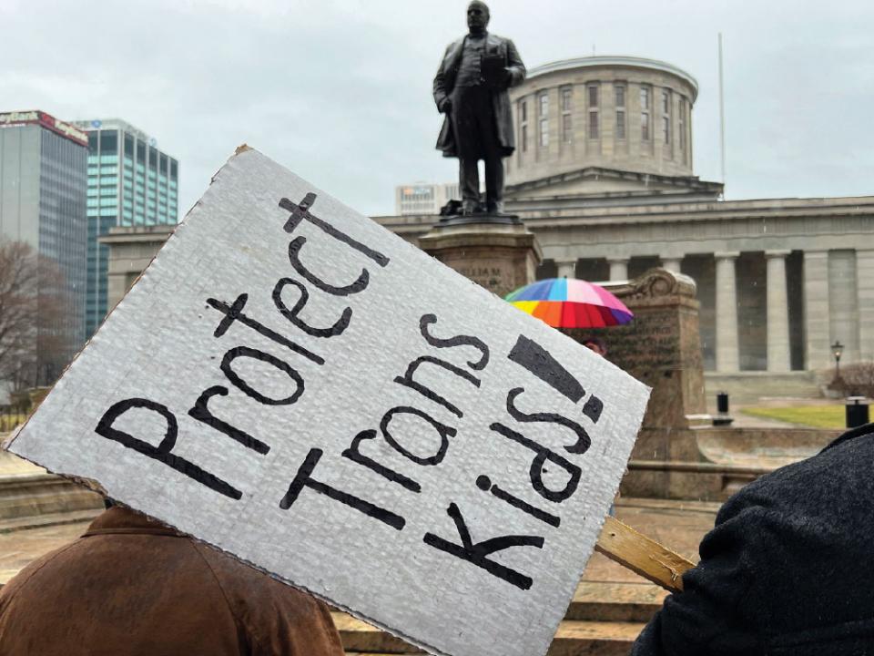 Demonstrators advocating for transgender rights and healthcare stand outside of the Ohio Statehouse, Jan. 24, 2024, in Columbus, Ohio. A federal appeals court on Wednesday, July 17, refused to lift a judge's order temporarily blocking the Biden administration's new Title IX rule meant to expand protections for LGBTQ+ students. Photo by Patrick Orsagos, AP.