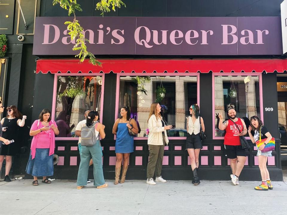 Patrons standing outside the grand opening of Dani's Queer Bar at 909 Boylston St. in Boston on Thursday, Sept. 12, 2024. Photo by Rachel Armany, GBH News.