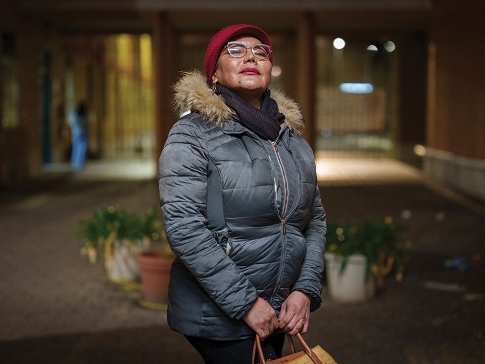 Moira Camila Garnica poses for a portrait outside the Beata Vergine Immacolata parish church in Torvaianica, Italy.  (AP Photo by Bernat Armangue.